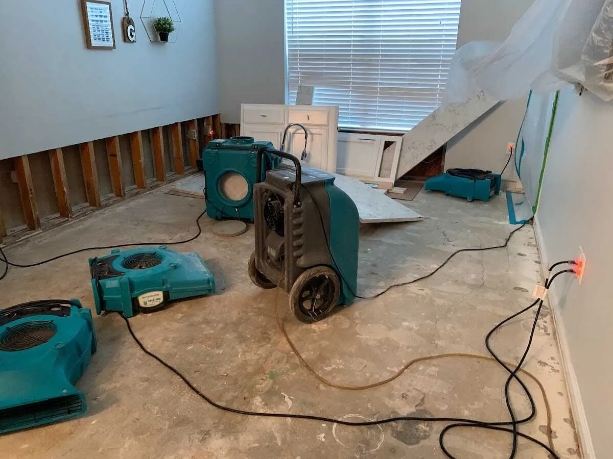 Dehumidifier in flood-cut room for Water Damage Restoration in Champlain